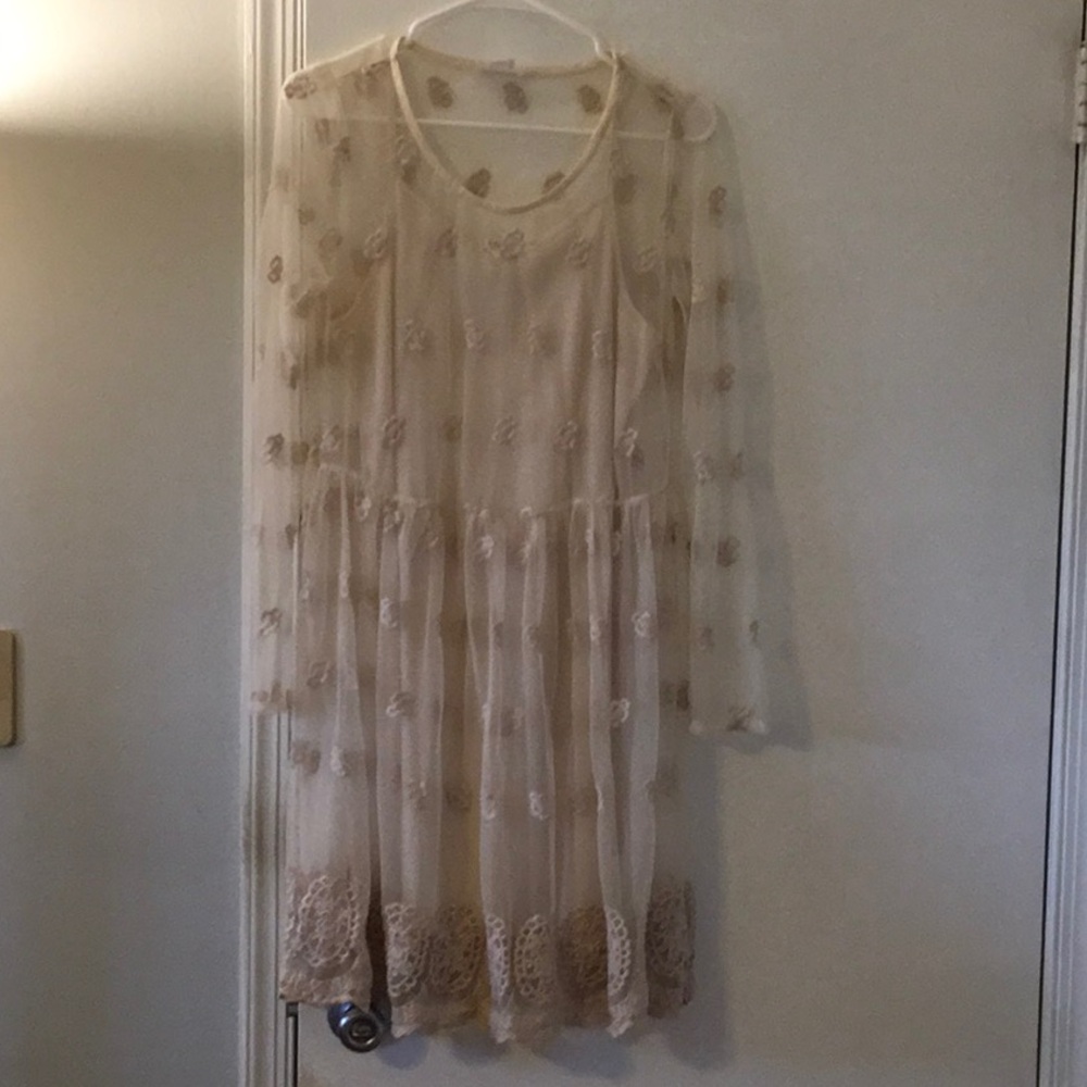 Worn one Venus dress with button in slip